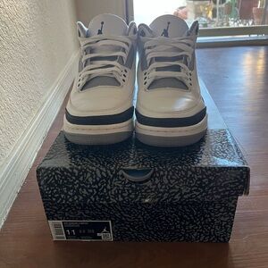 Jordan Retro White and Black Sneakers